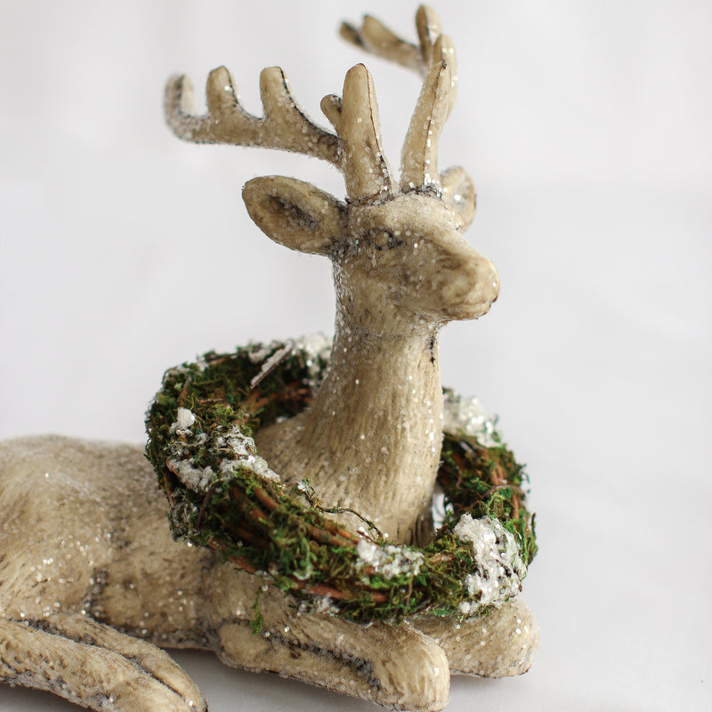 Resting Deer with Wreath